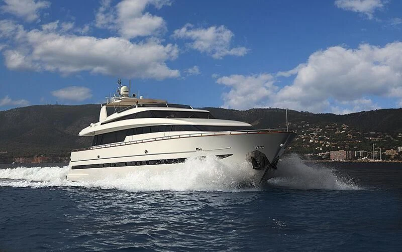a boat splashing in the water aboard CAROM Yacht for Sale