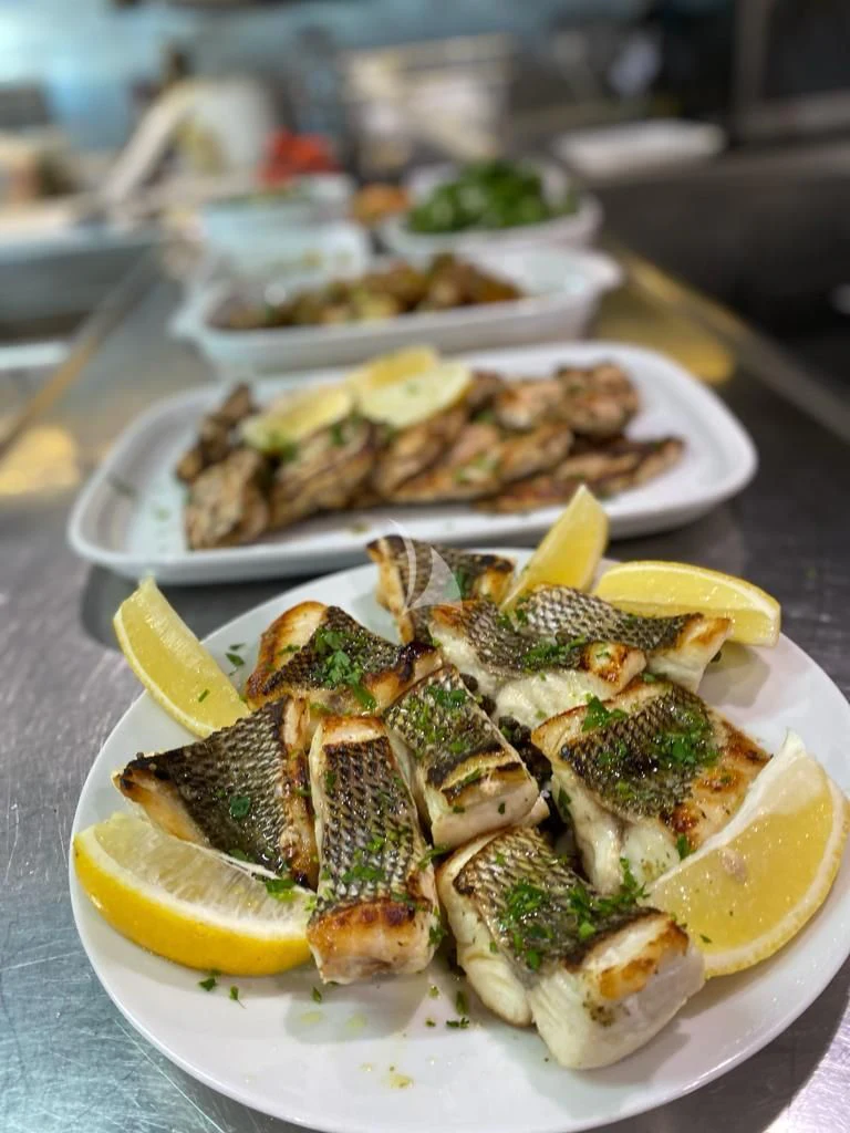a plate of food aboard CAROM Yacht for Sale