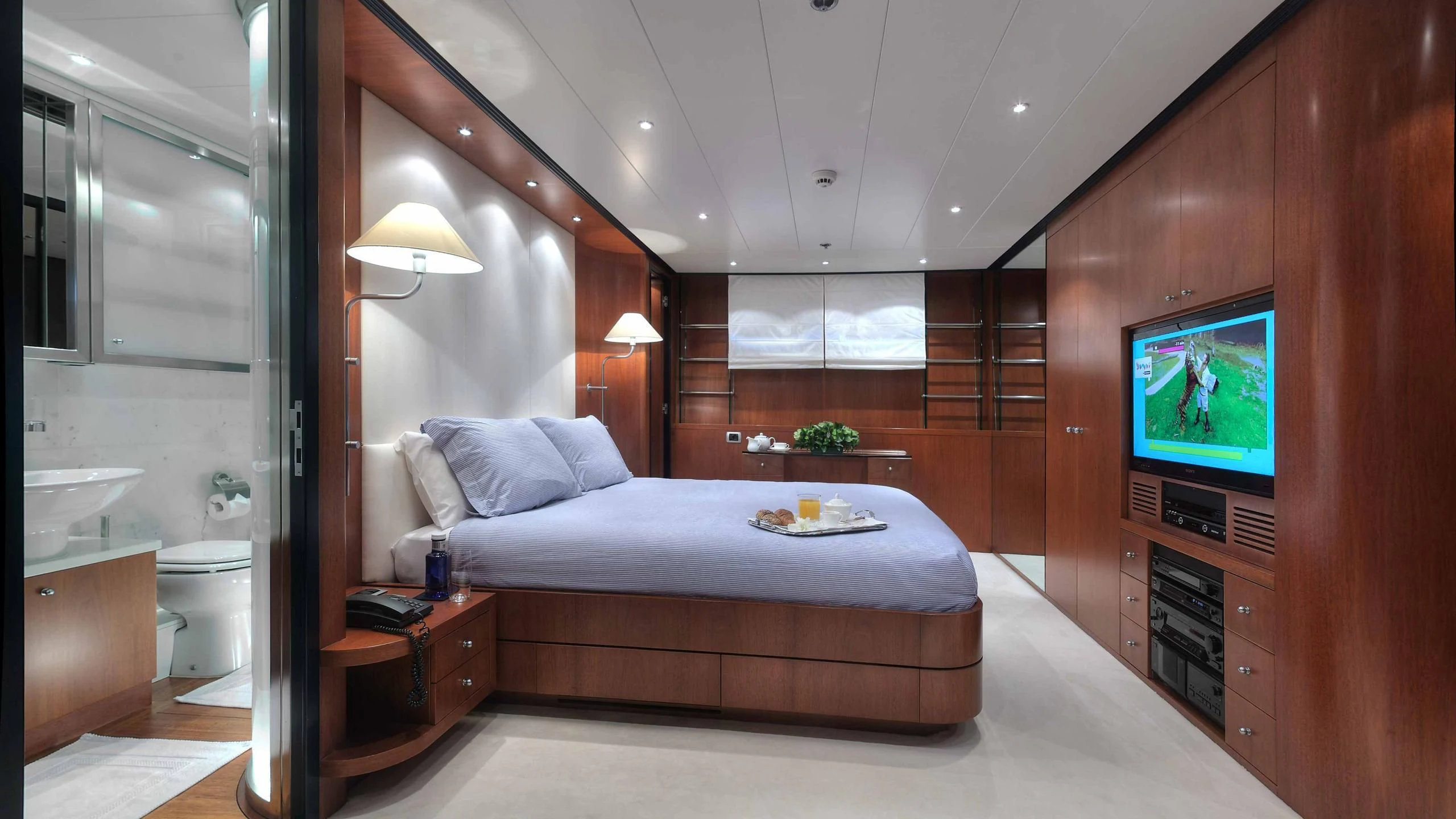 a bed in a room aboard CAROM Yacht for Sale
