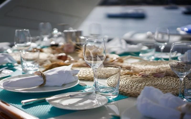 a table full of food aboard CAROM Yacht for Sale