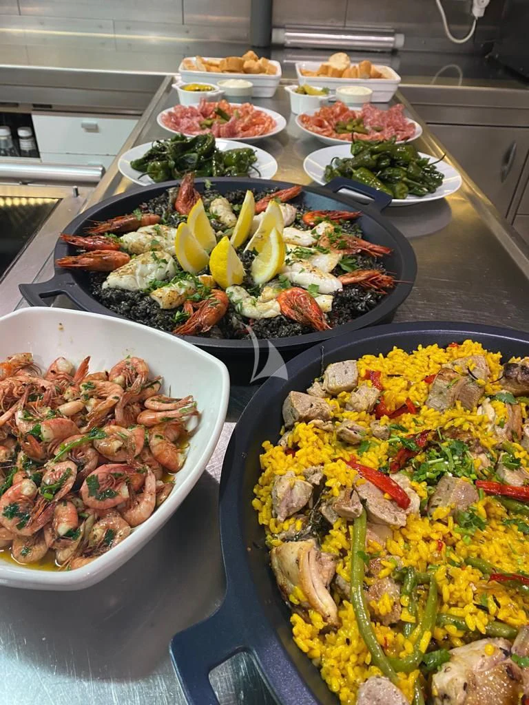 a table full of food aboard CAROM Yacht for Sale