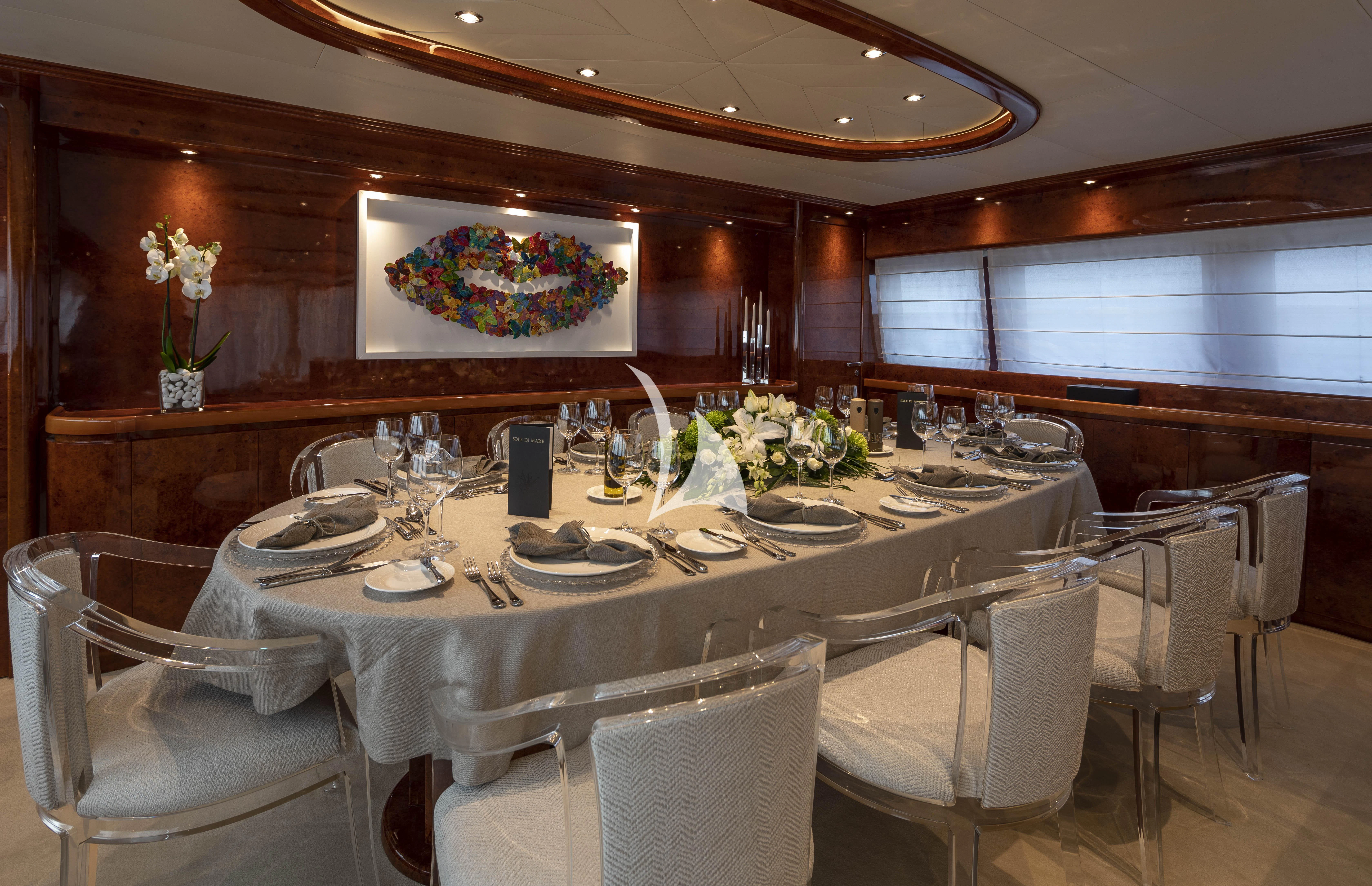 a table set for a dinner aboard SOLE DI MARE Yacht for Sale