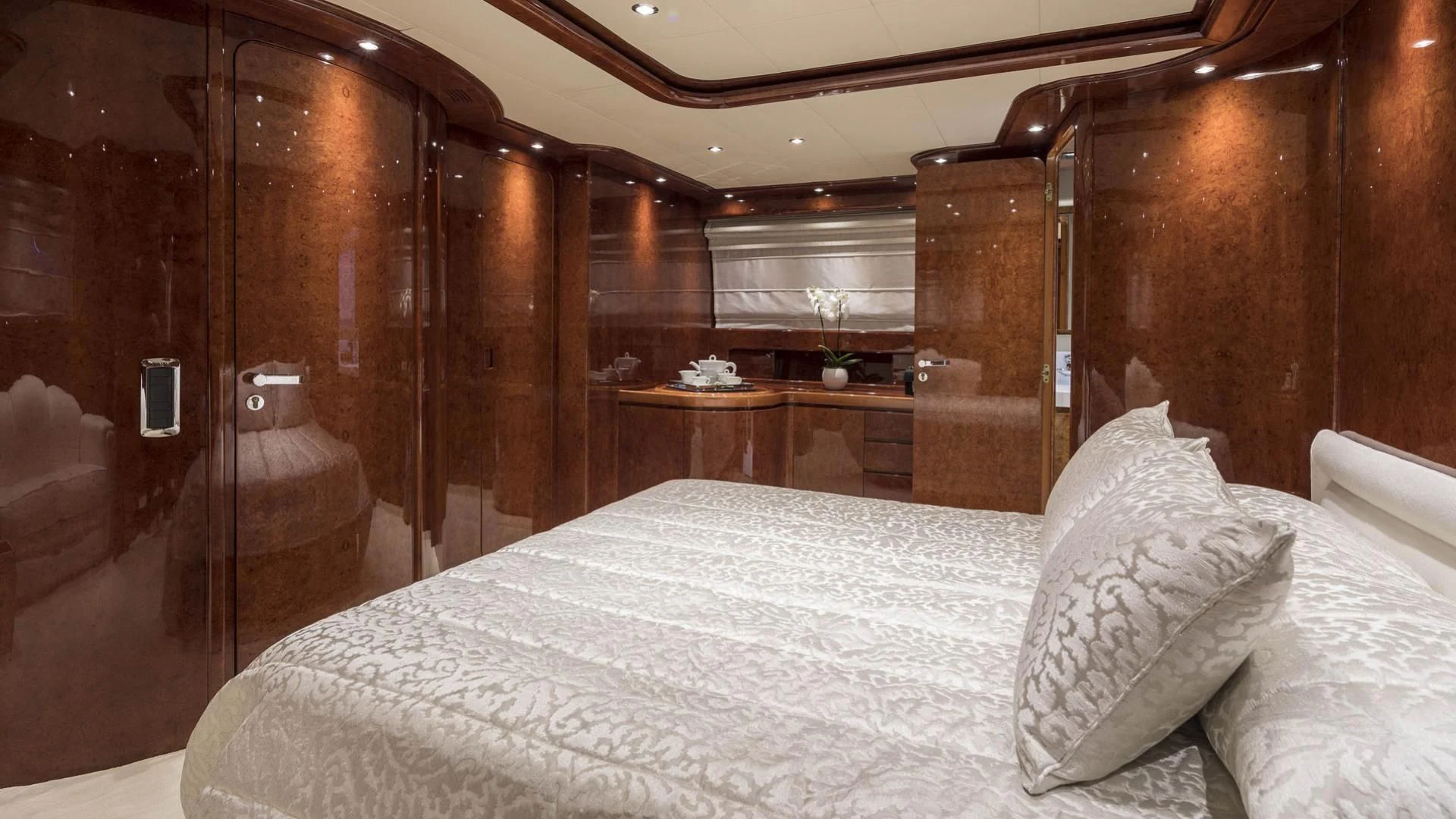 a bed with a white sheet aboard SOLE DI MARE Yacht for Sale
