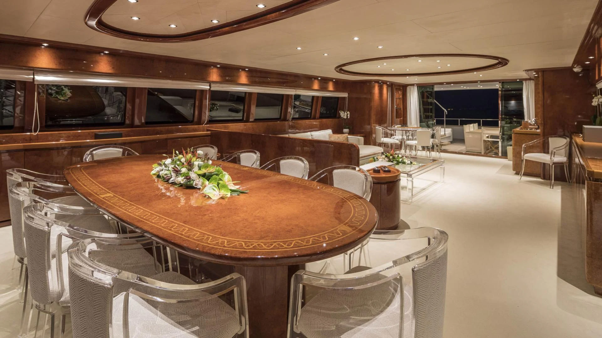a large dining table in a large room aboard SOLE DI MARE Yacht for Sale