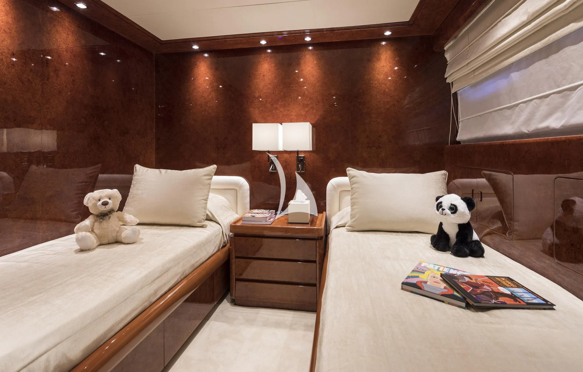 a couple of stuffed animals sit on a bed aboard SOLE DI MARE Yacht for Sale