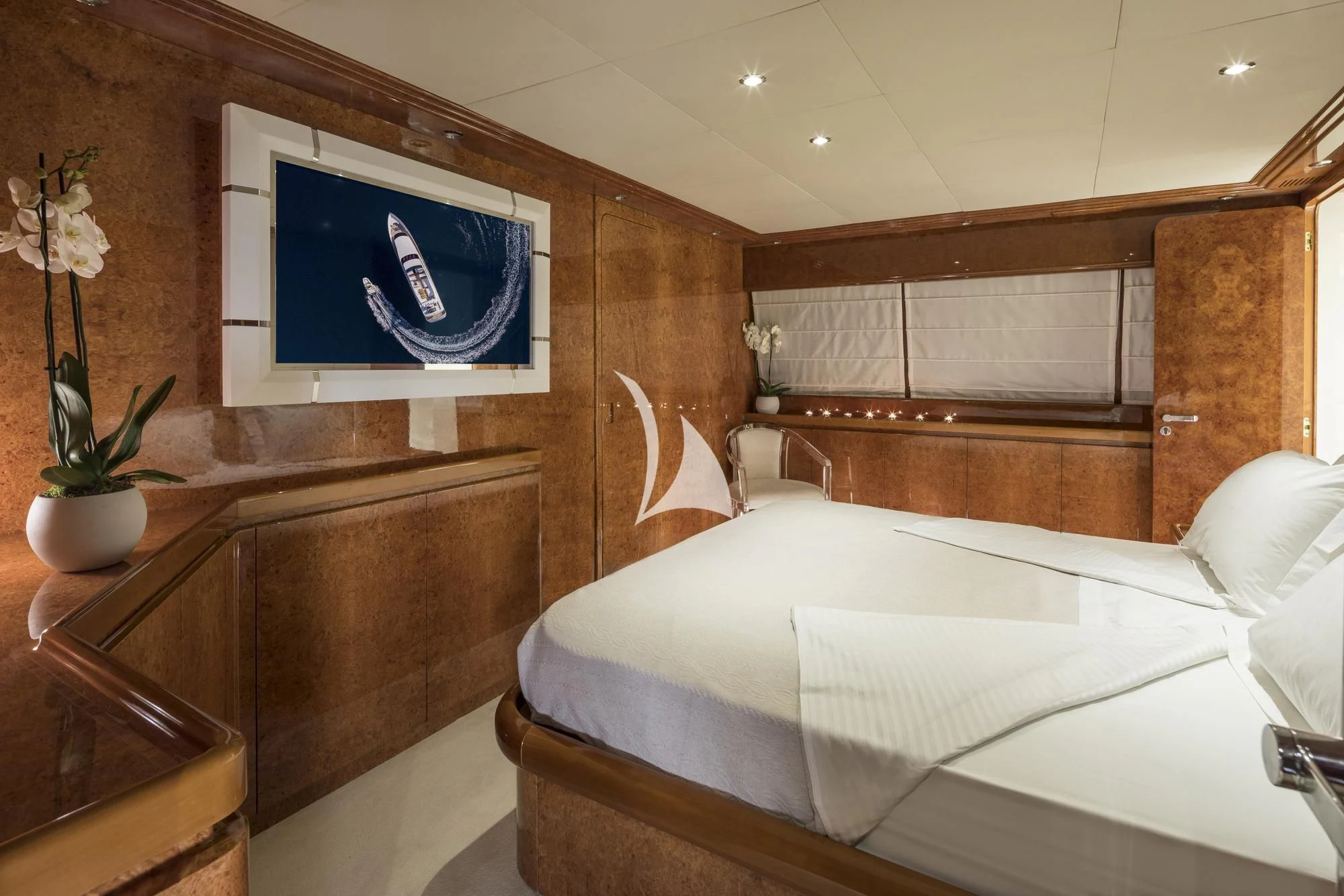a room with a bed and a television aboard SOLE DI MARE Yacht for Sale