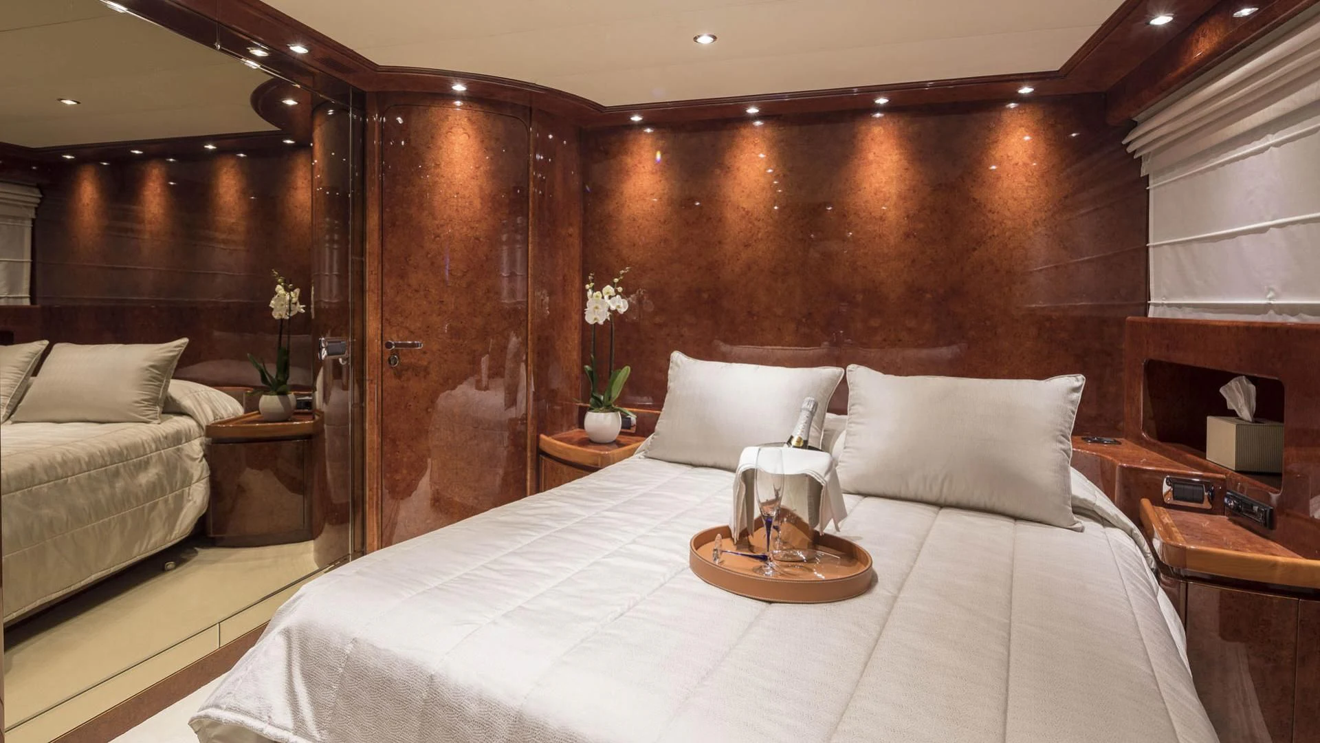 a bed with white sheets and pillows aboard SOLE DI MARE Yacht for Sale