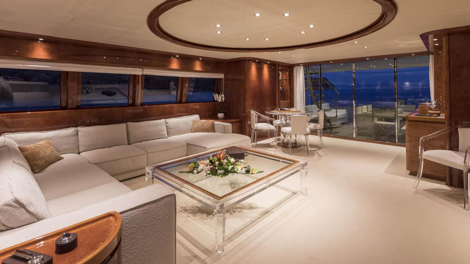 a living room with a large window aboard SOLE DI MARE Yacht for Sale