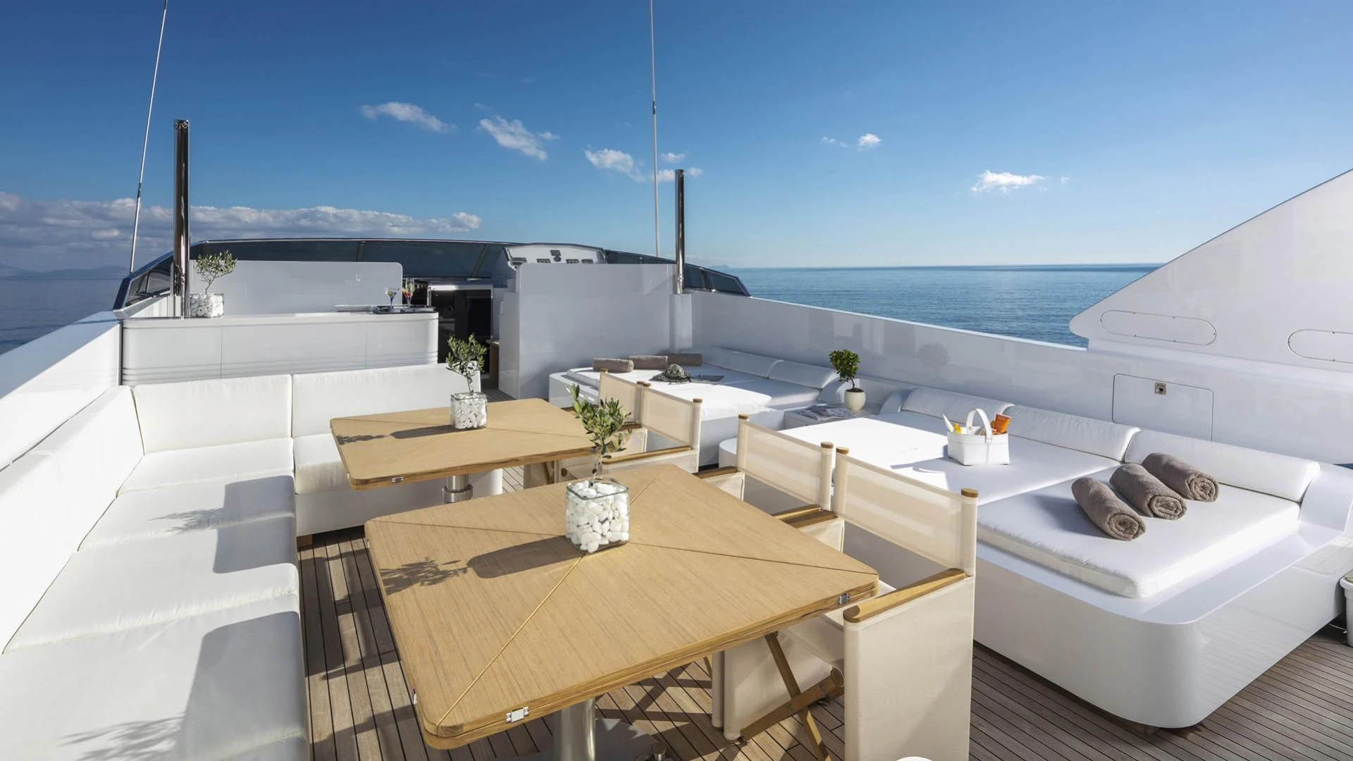 a room with a table and chairs aboard SOLE DI MARE Yacht for Sale
