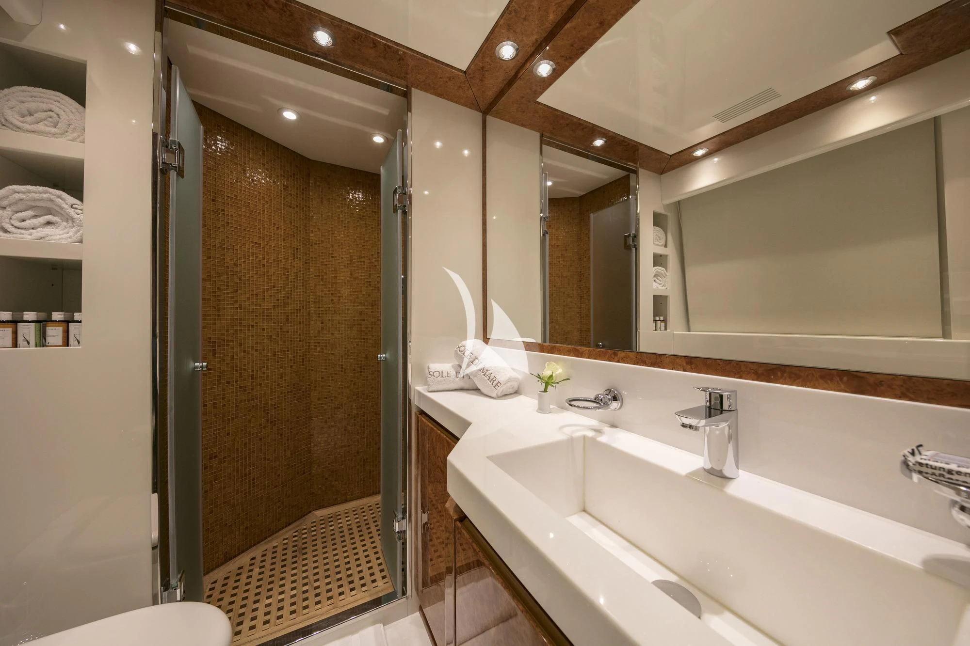 a bathroom with a large mirror aboard SOLE DI MARE Yacht for Sale