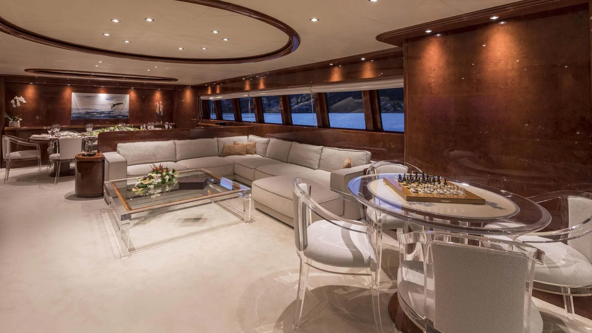 a room with a table and chairs aboard SOLE DI MARE Yacht for Sale