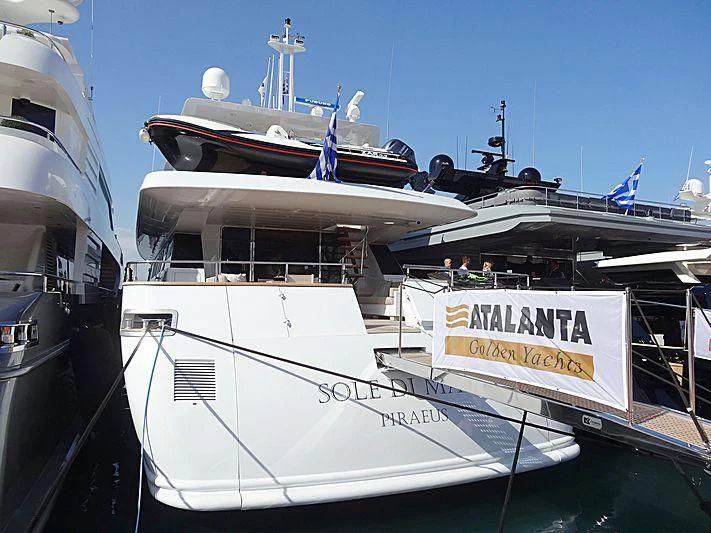 a boat docked at a pier aboard SOLE DI MARE Yacht for Sale