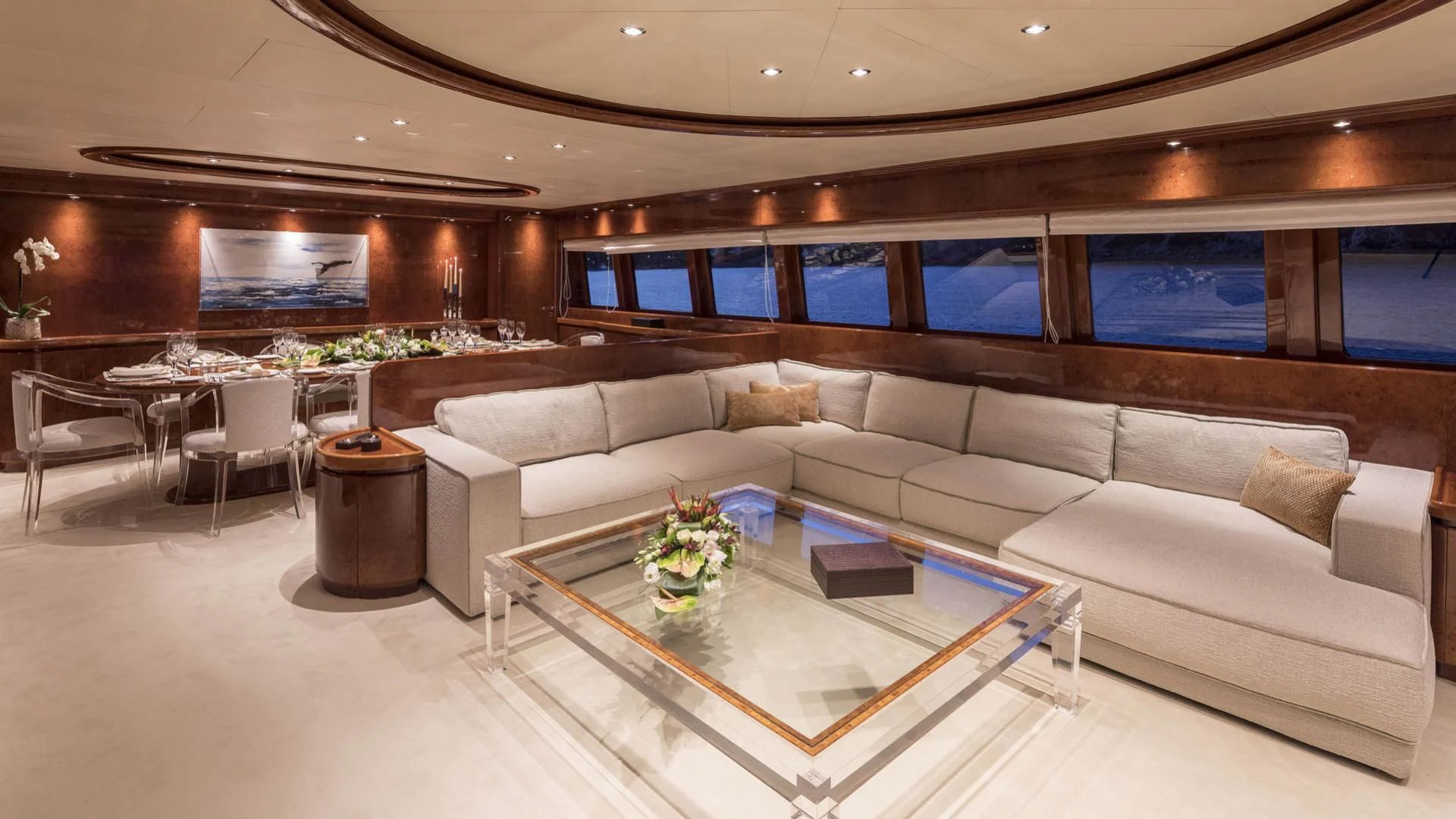 a living room with a couch and a table aboard SOLE DI MARE Yacht for Sale