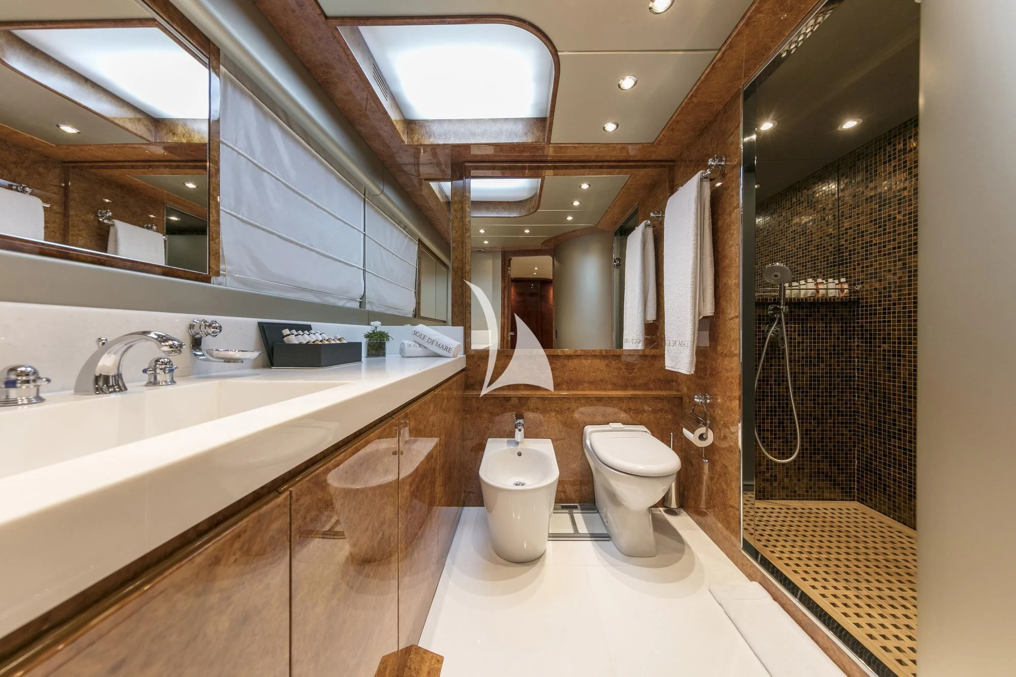 a bathroom with a large mirror aboard SOLE DI MARE Yacht for Sale