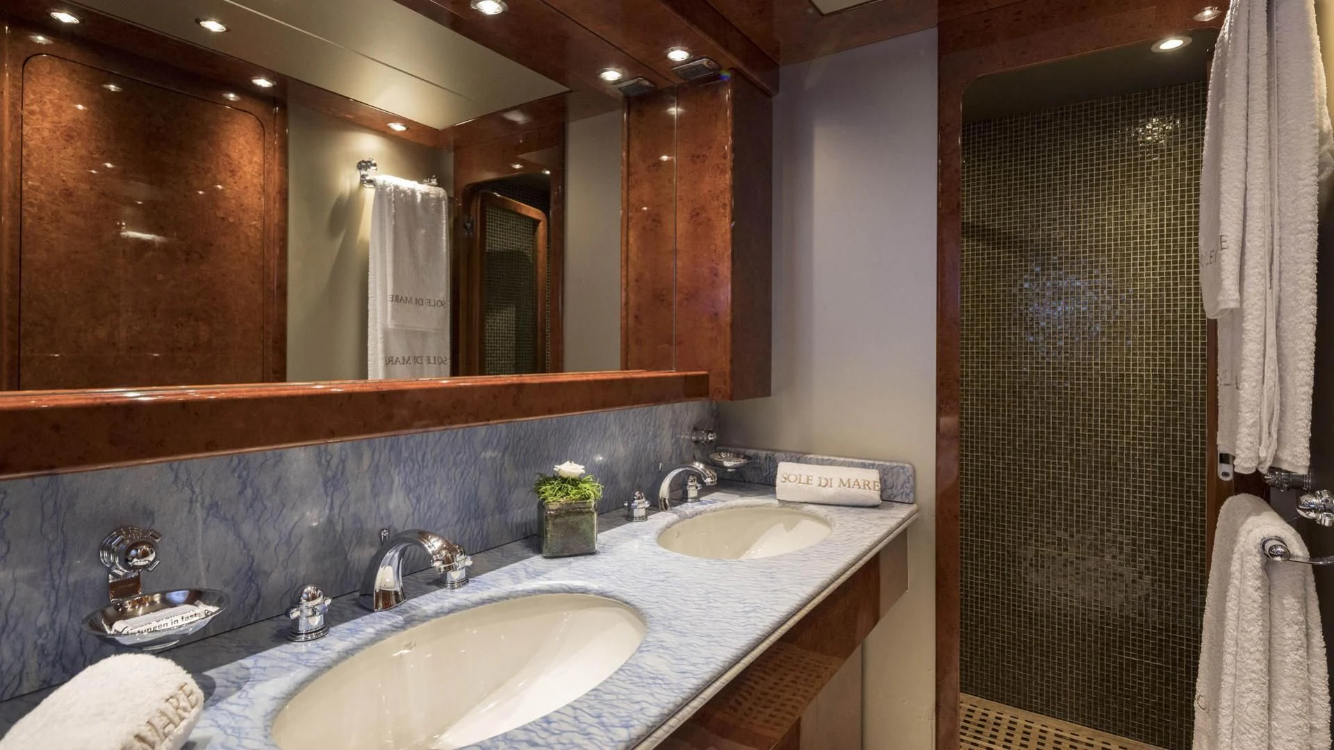 a bathroom with two sinks aboard SOLE DI MARE Yacht for Sale