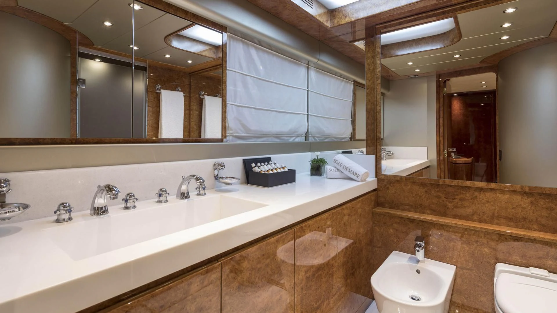 a bathroom with a couple sinks aboard SOLE DI MARE Yacht for Sale
