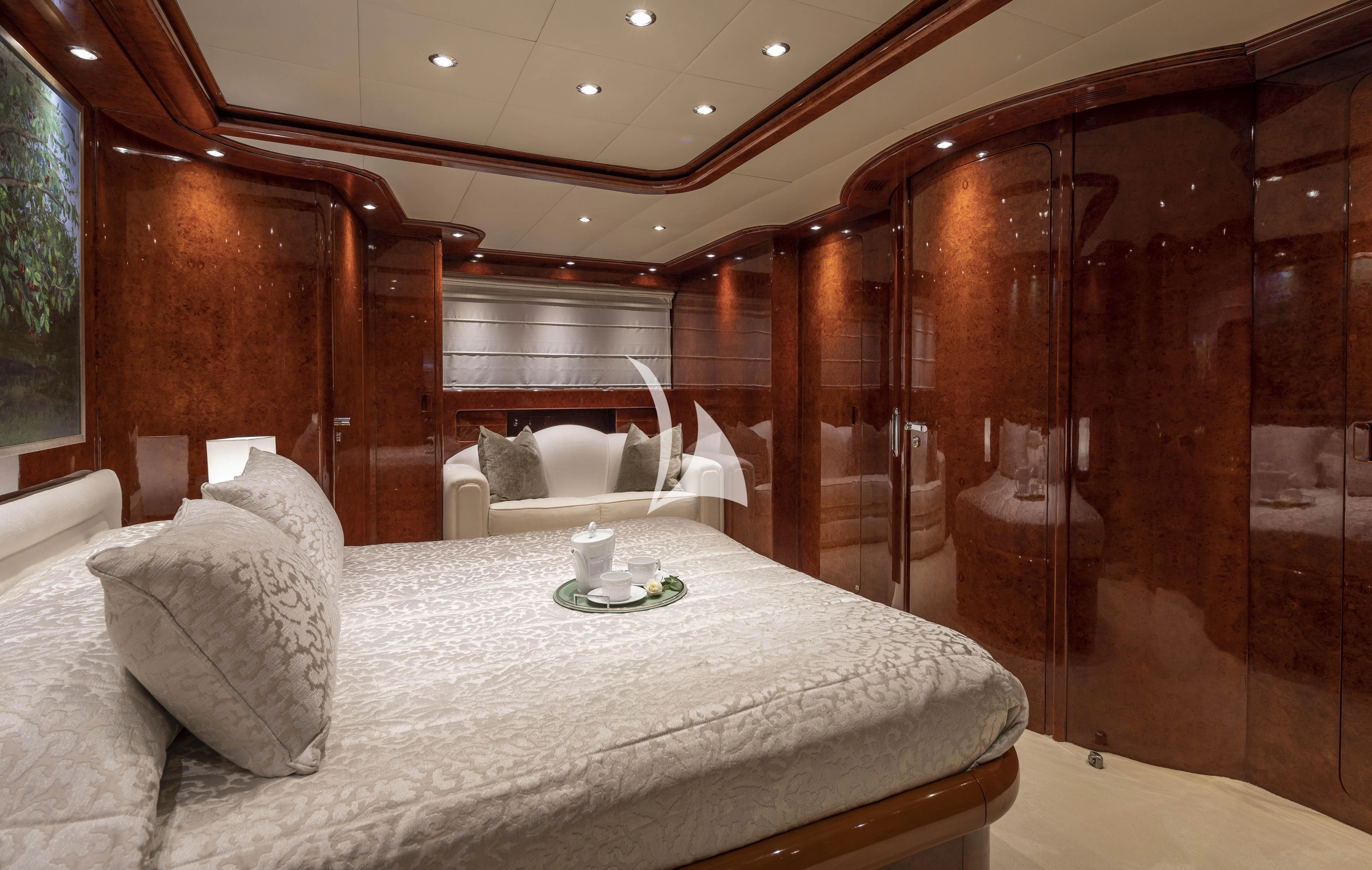a room with a bed and a table aboard SOLE DI MARE Yacht for Sale