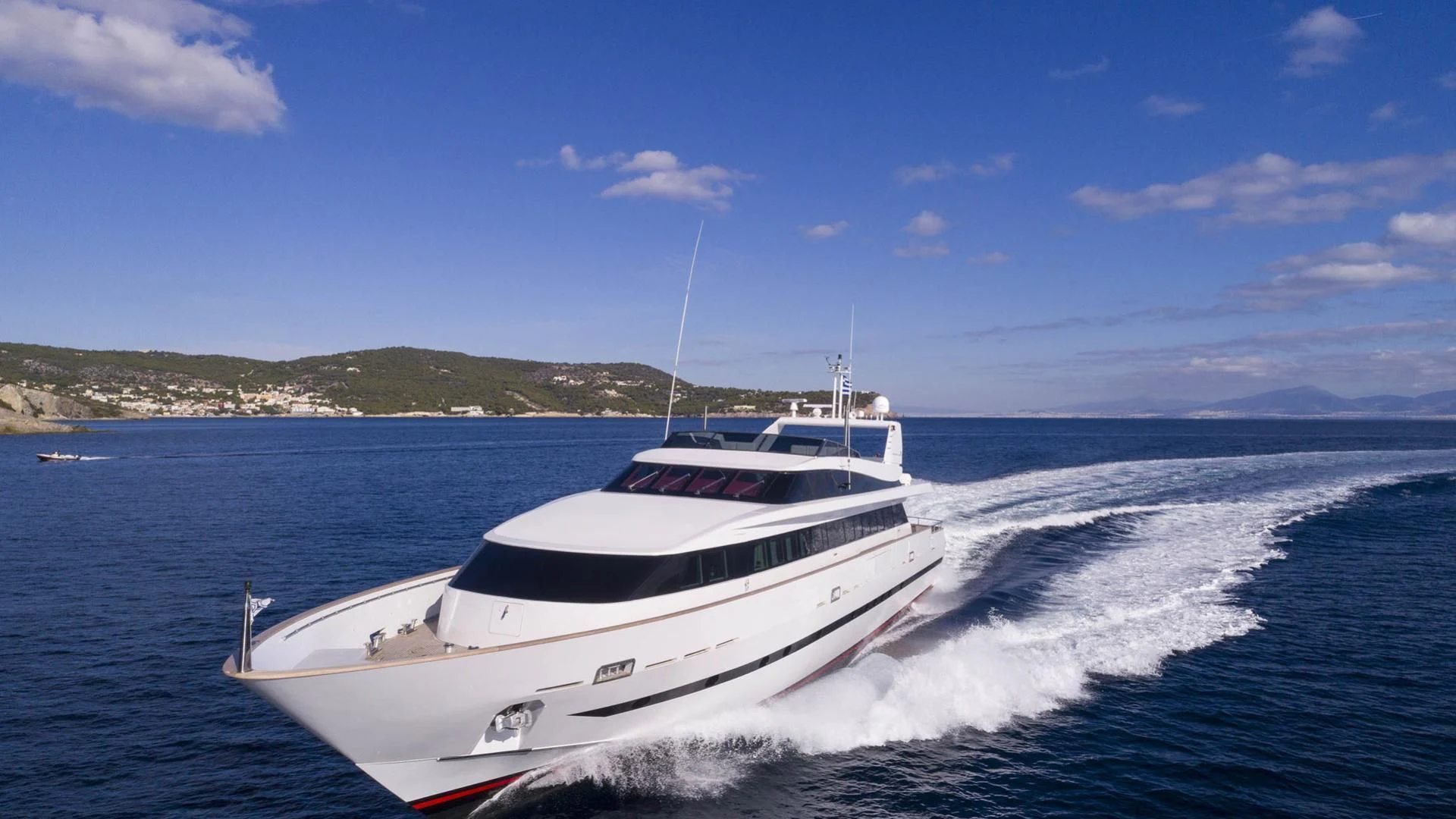 a white boat on the water aboard SOLE DI MARE Yacht for Sale