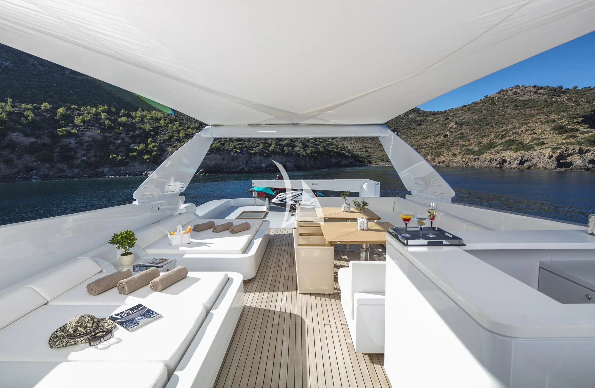 a modern house with a large deck overlooking a body of water aboard SOLE DI MARE Yacht for Sale