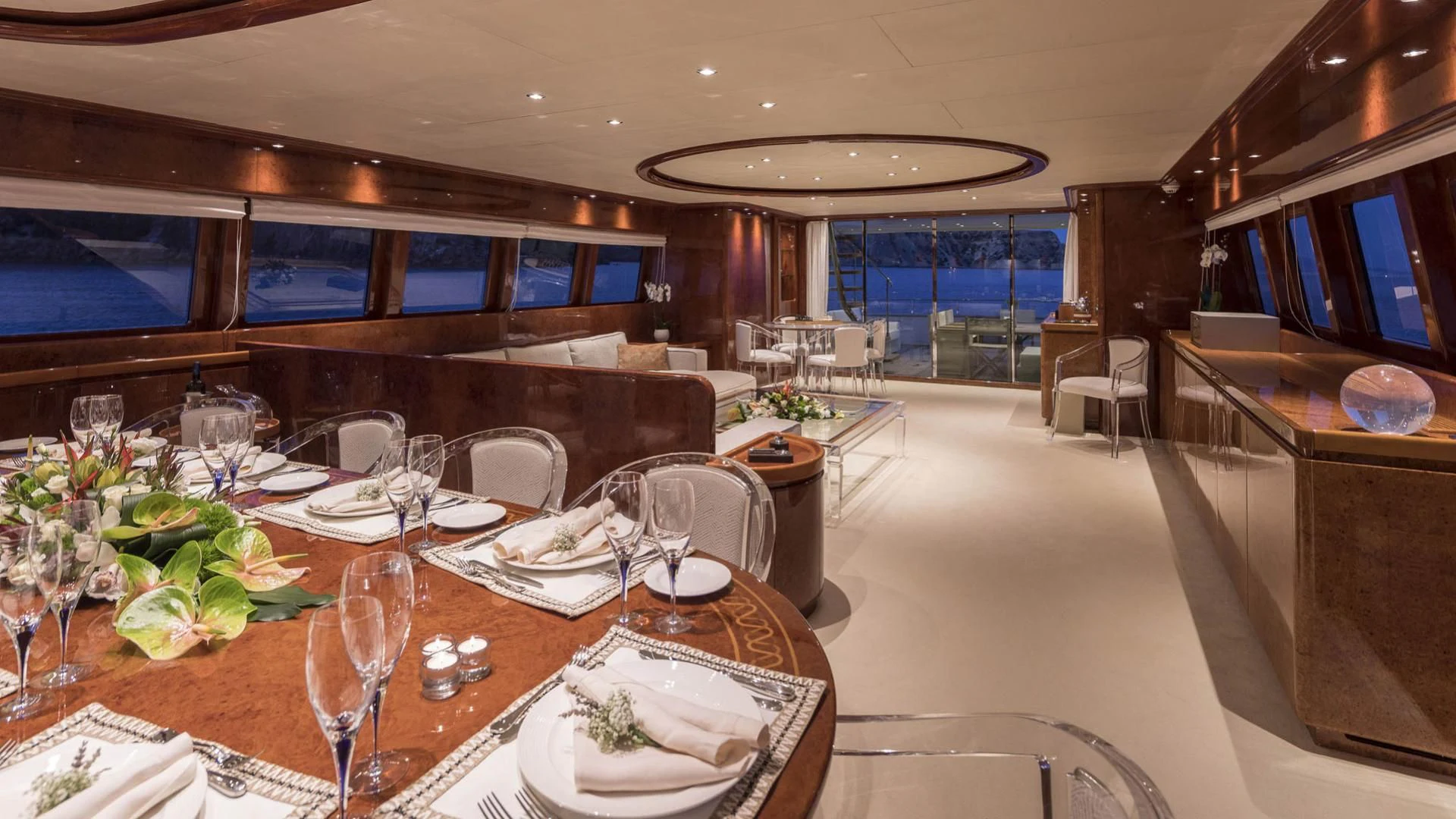 a large dining room with a large table and chairs aboard SOLE DI MARE Yacht for Sale