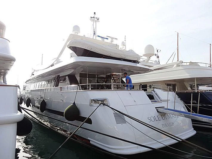 a boat docked at a pier aboard SOLE DI MARE Yacht for Sale