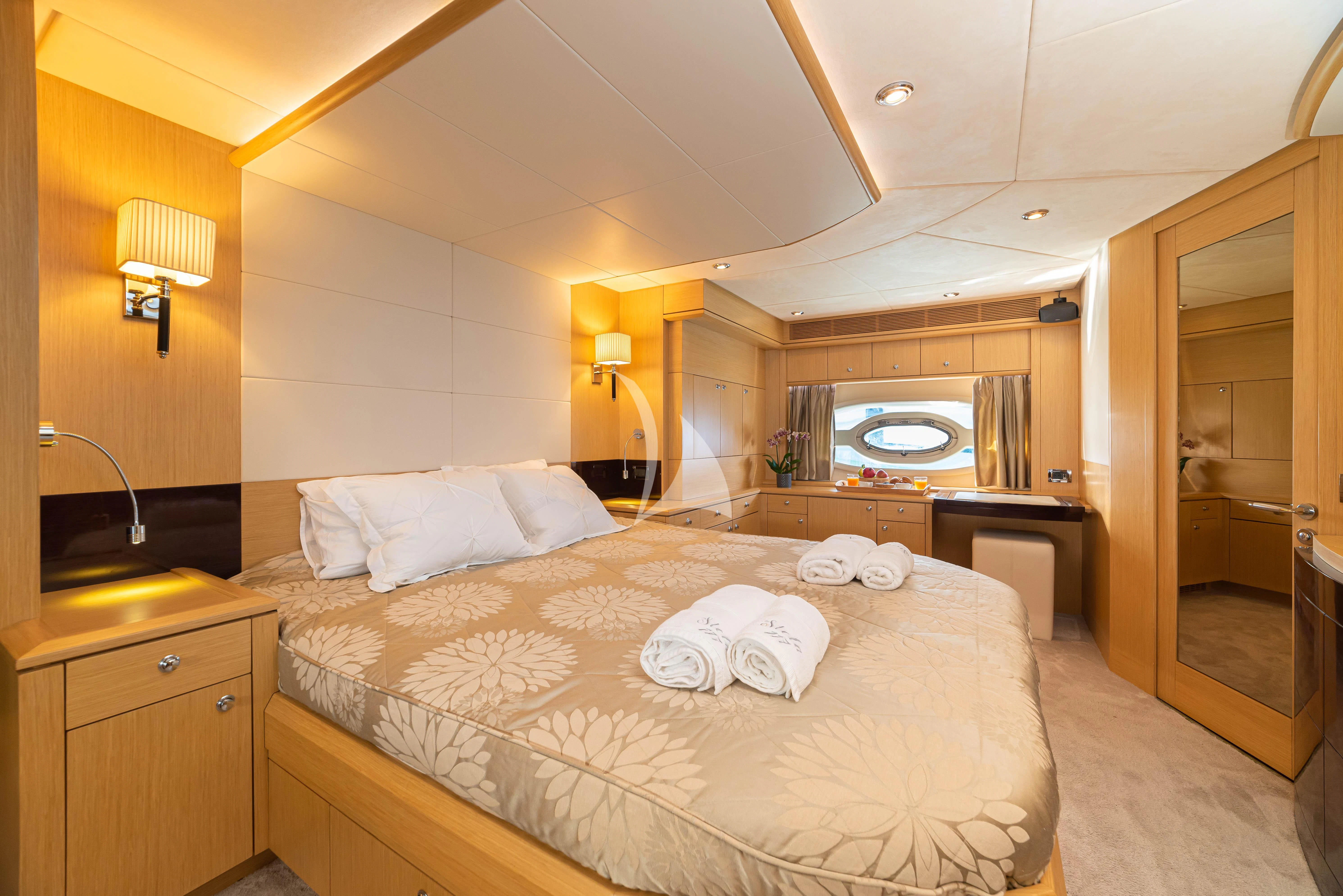 a bed in a hotel room aboard STELA 117 Yacht for Sale