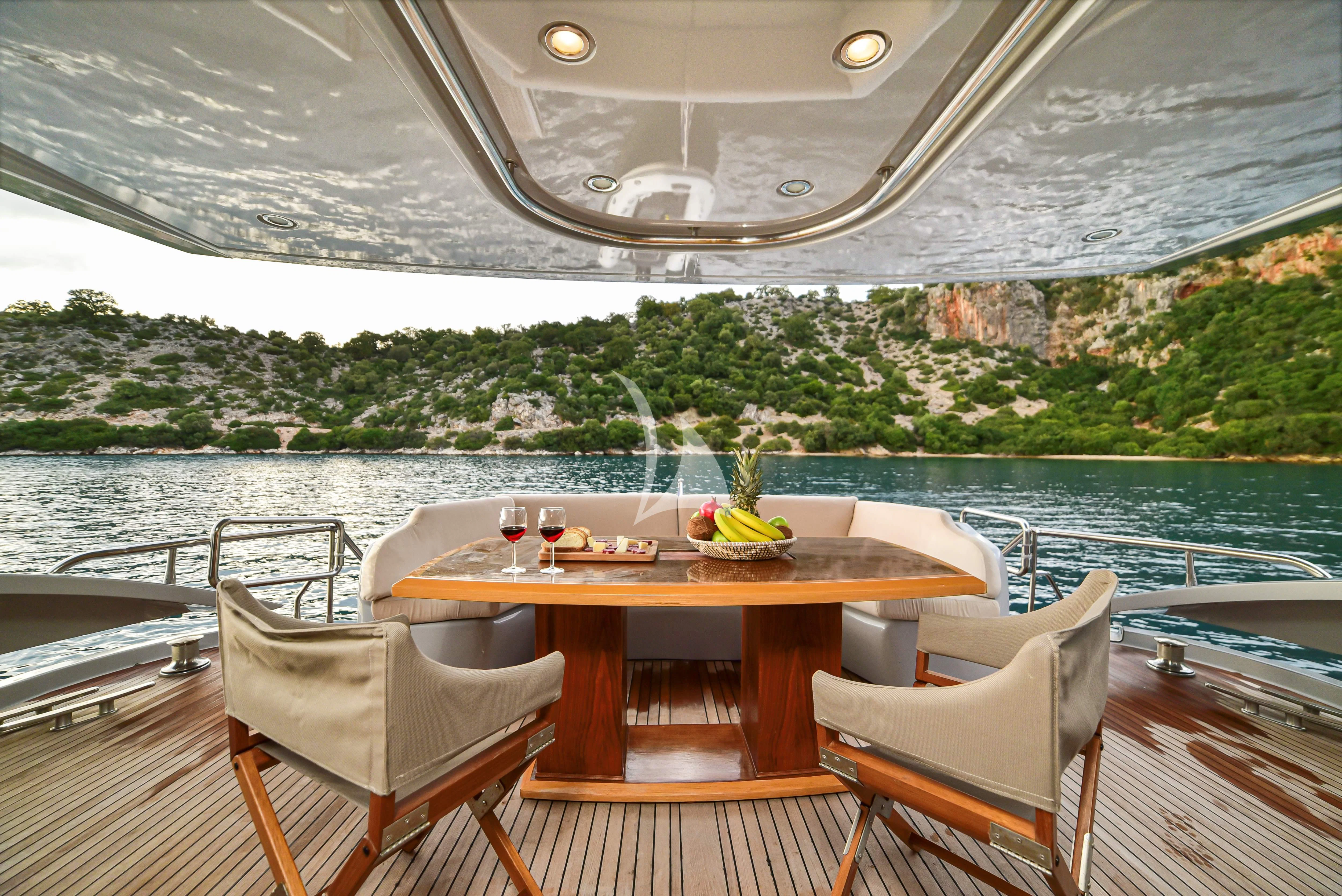 a table on a boat aboard STELA 117 Yacht for Sale