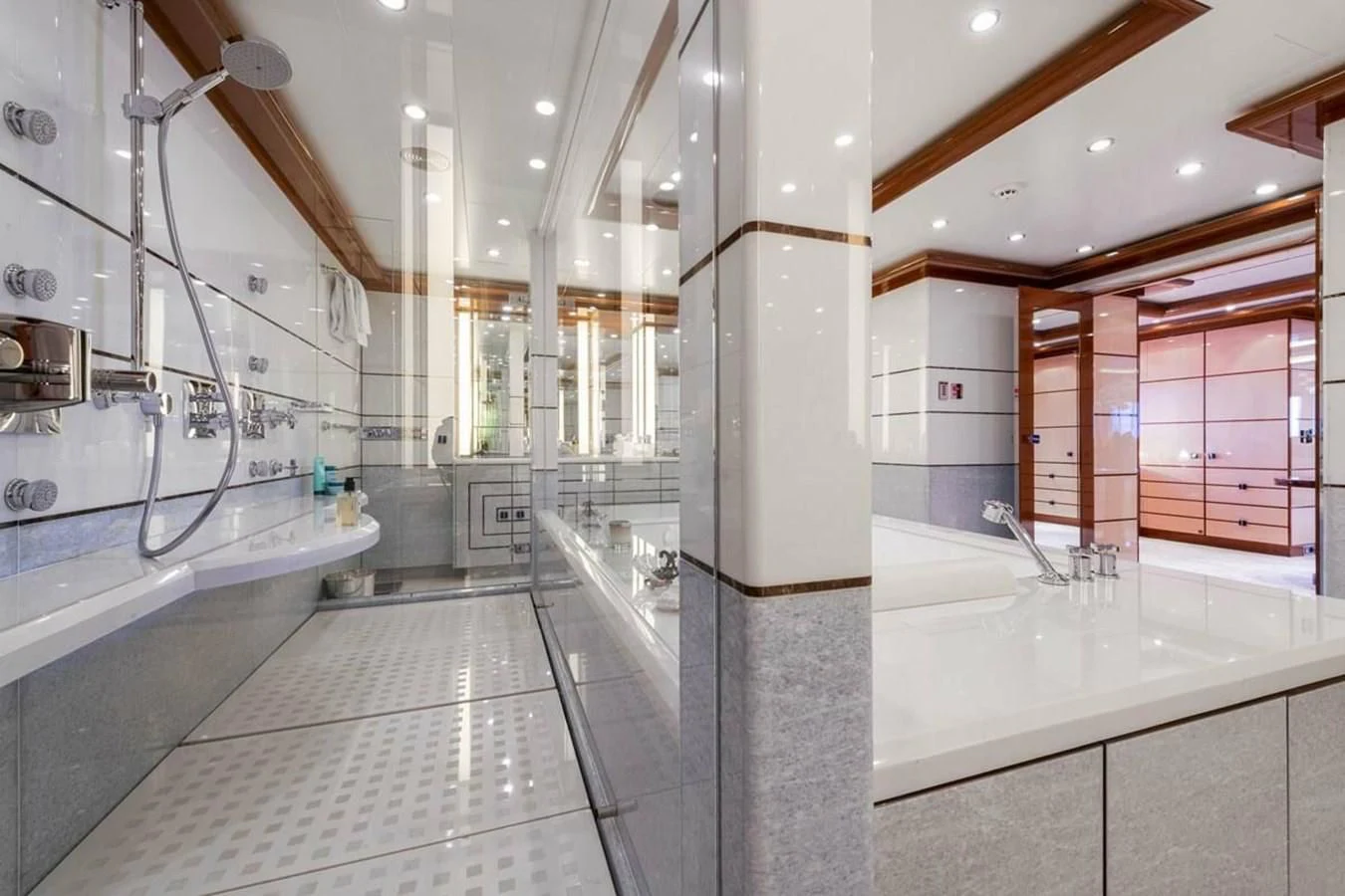 a large bathroom with a large tub aboard BATELLO Yacht for Sale