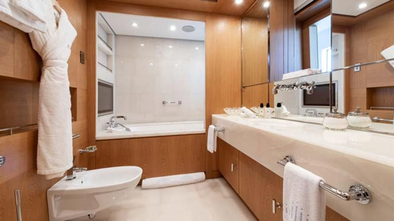 a bathroom with a sink and a bathtub aboard BATELLO Yacht for Sale