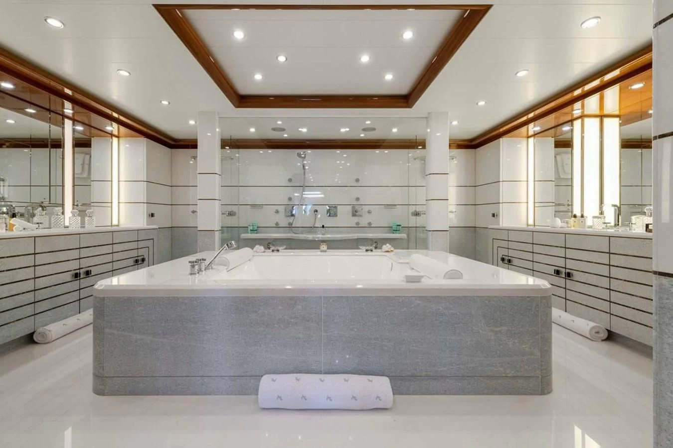 a large bathroom with a large jacuzzi aboard BATELLO Yacht for Sale