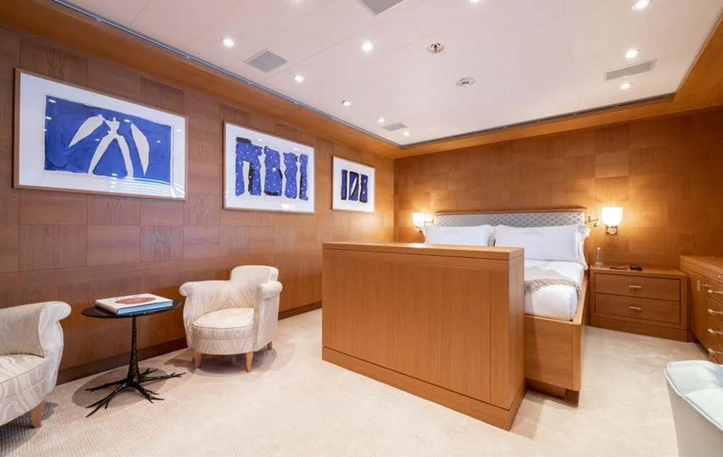 a room with a bed and a desk aboard BATELLO Yacht for Sale