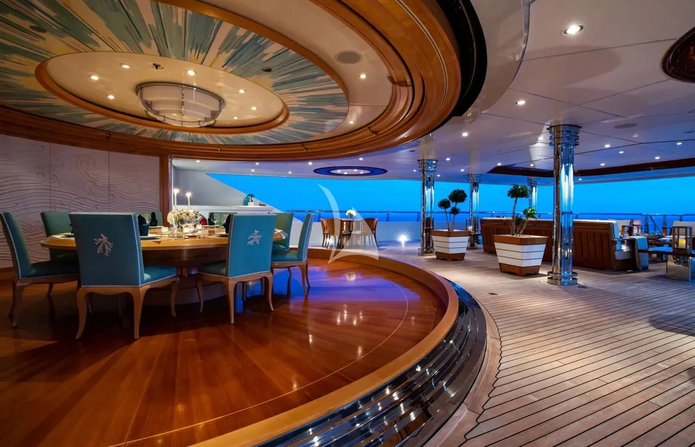 a pool with a bar and chairs aboard BATELLO Yacht for Sale