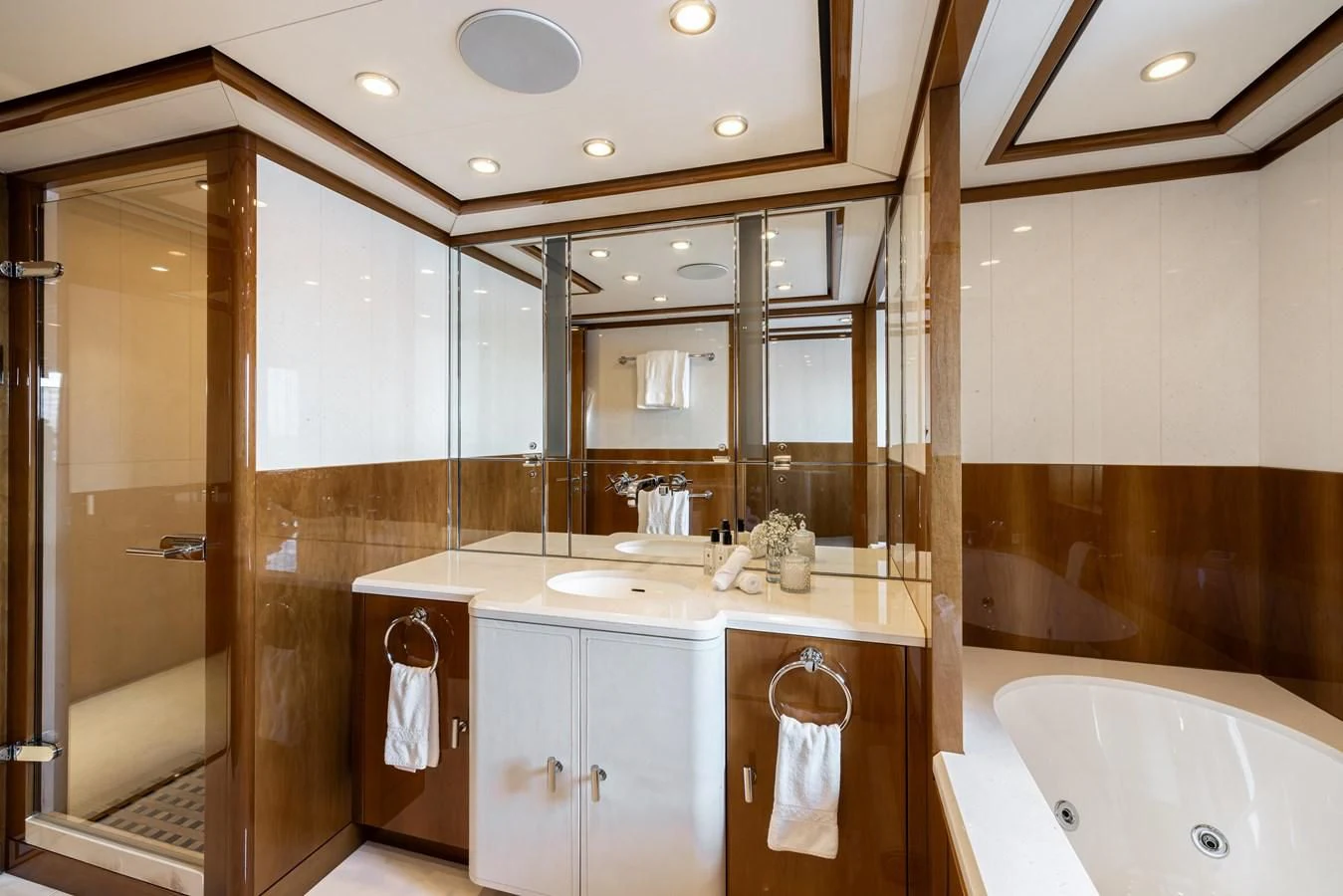 a bathroom with a large mirror aboard BATELLO Yacht for Sale