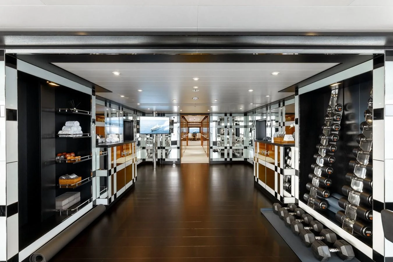 a room with shelves and cabinets aboard BATELLO Yacht for Sale