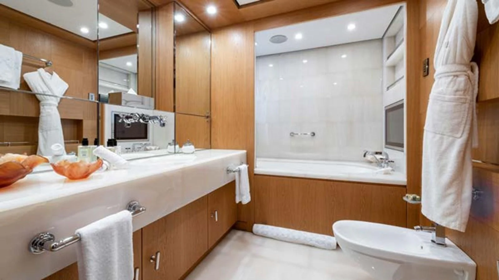 a bathroom with a sink and a bathtub aboard BATELLO Yacht for Sale