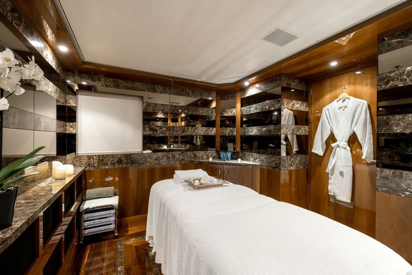 a large bathroom with a large mirror aboard BATELLO Yacht for Sale