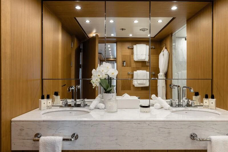 a bathroom with a large mirror aboard BATELLO Yacht for Sale