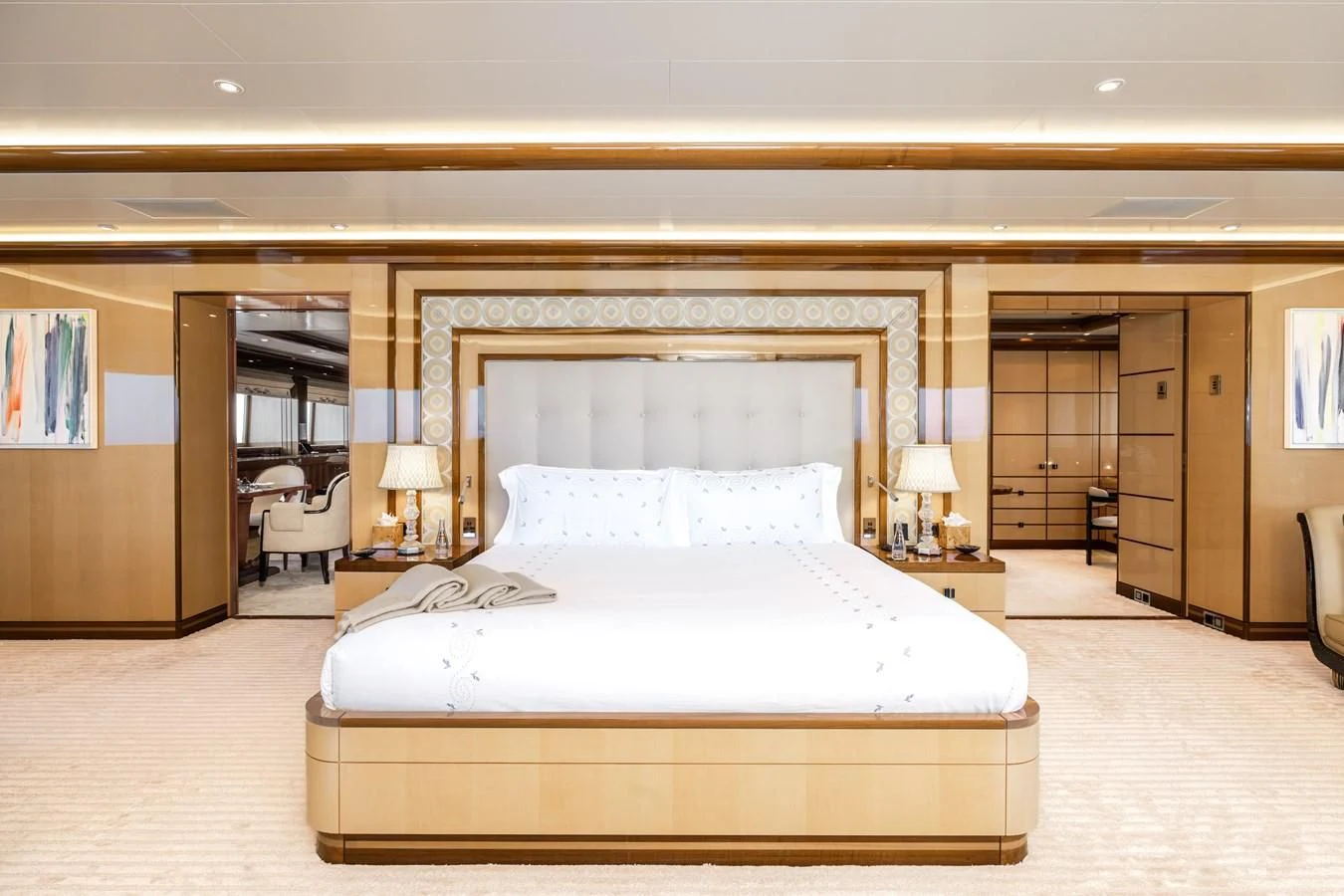 a large bedroom with a large bed aboard BATELLO Yacht for Sale