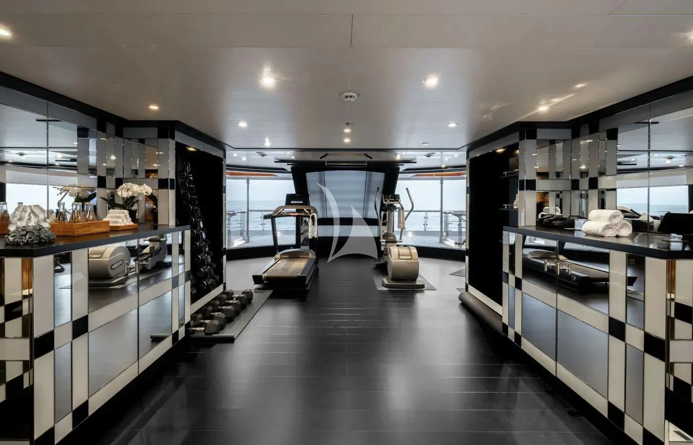 a large kitchen with glass walls aboard BATELLO Yacht for Sale