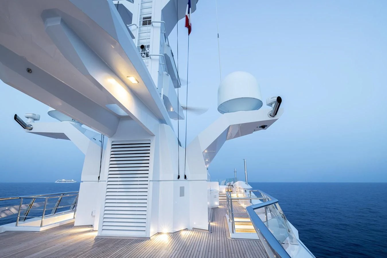 a white boat on a body of water aboard BATELLO Yacht for Sale