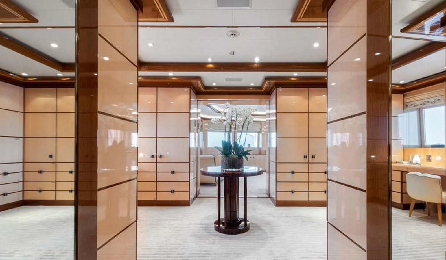 a room with a table and chairs aboard BATELLO Yacht for Sale