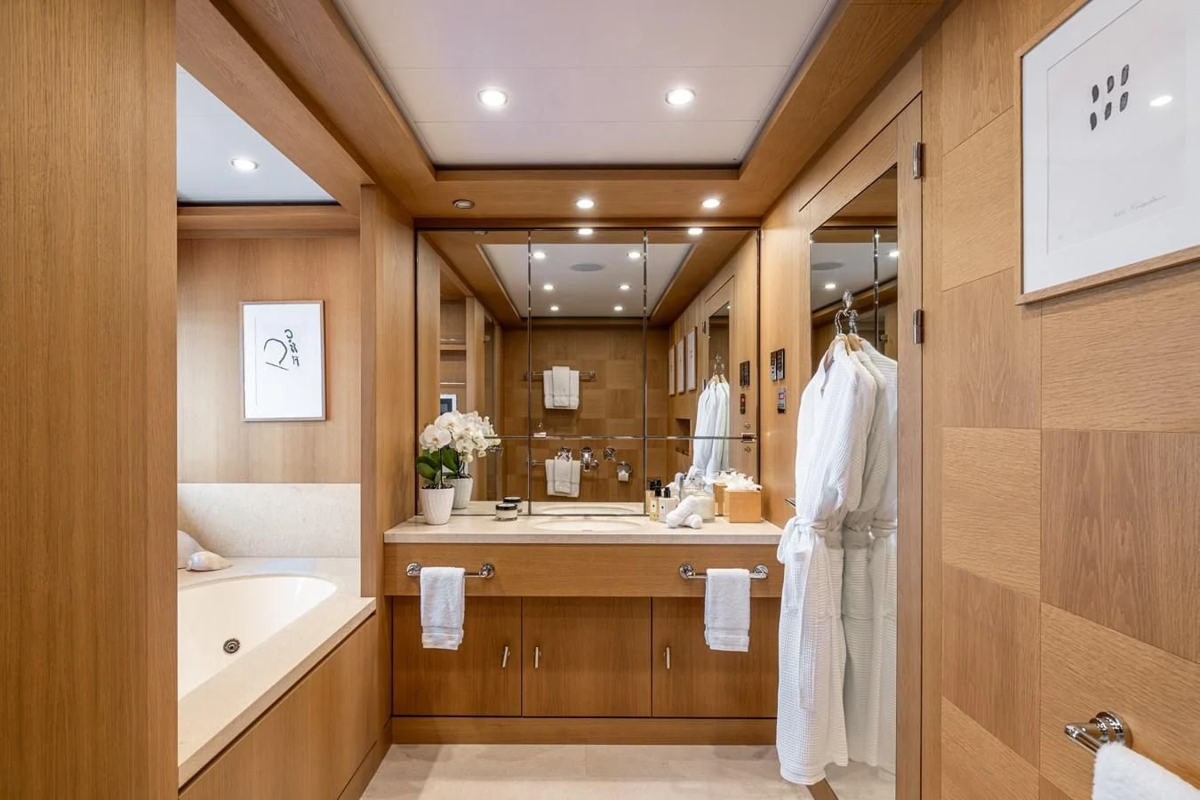 a bathroom with a large mirror aboard BATELLO Yacht for Sale
