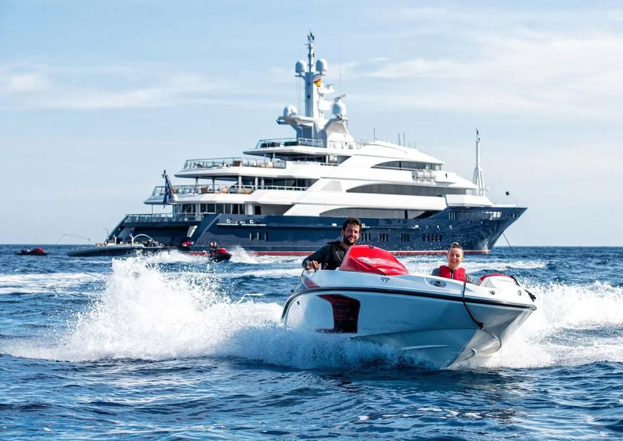 a white boat with people on it aboard BATELLO Yacht for Sale