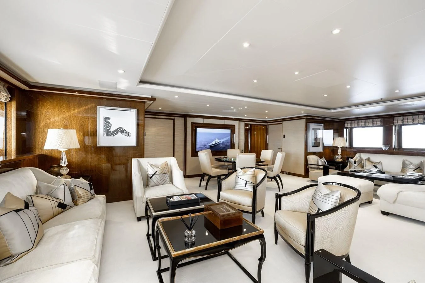 a living room with a couch and a table aboard BATELLO Yacht for Sale