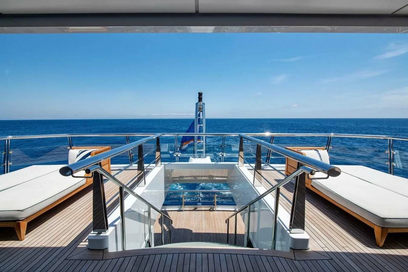 a deck with a large ship aboard BATELLO Yacht for Sale