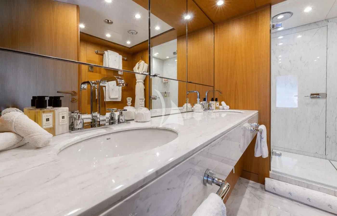 a bathroom with a large mirror aboard BATELLO Yacht for Sale
