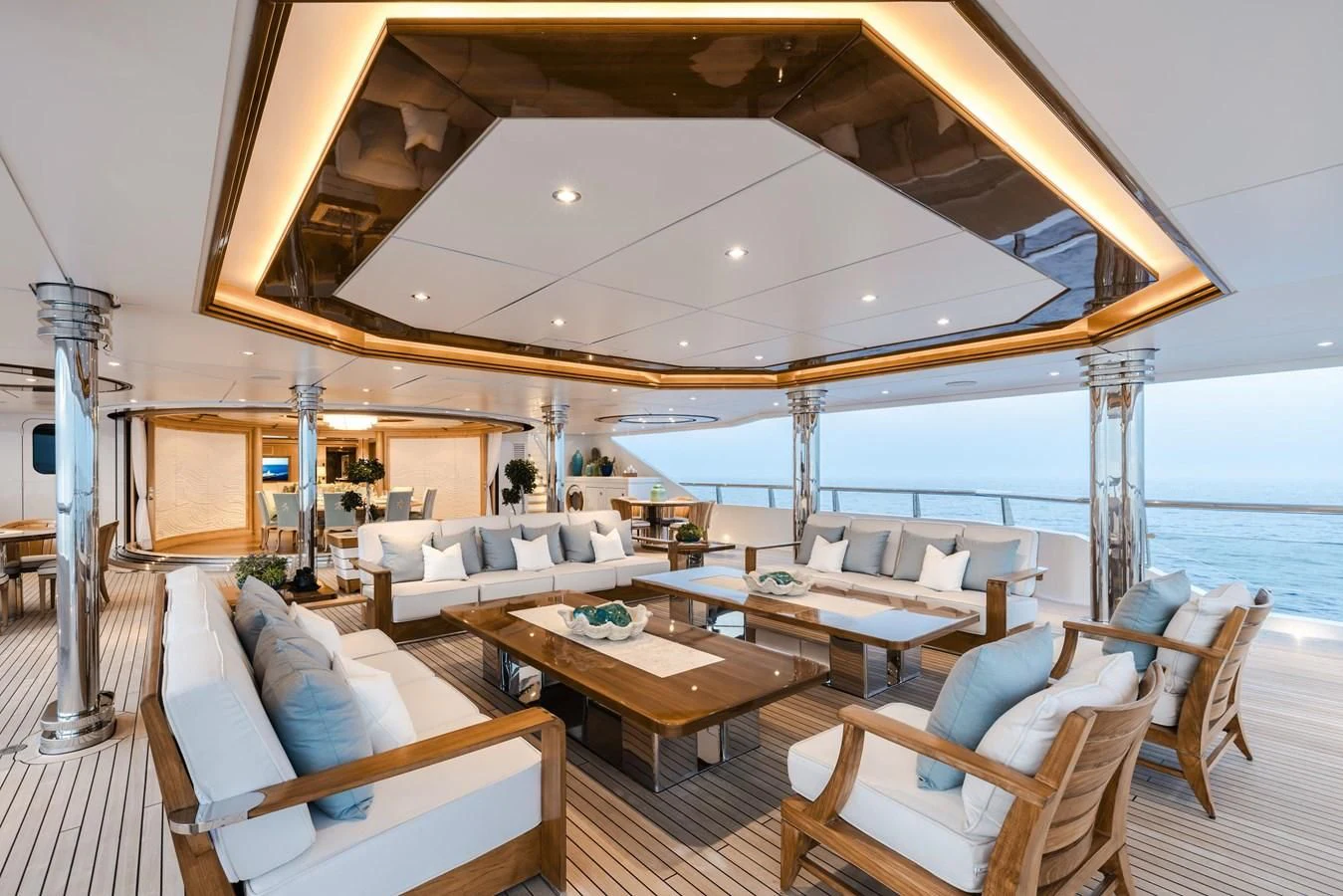a room with a table chairs and a large window aboard BATELLO Yacht for Sale