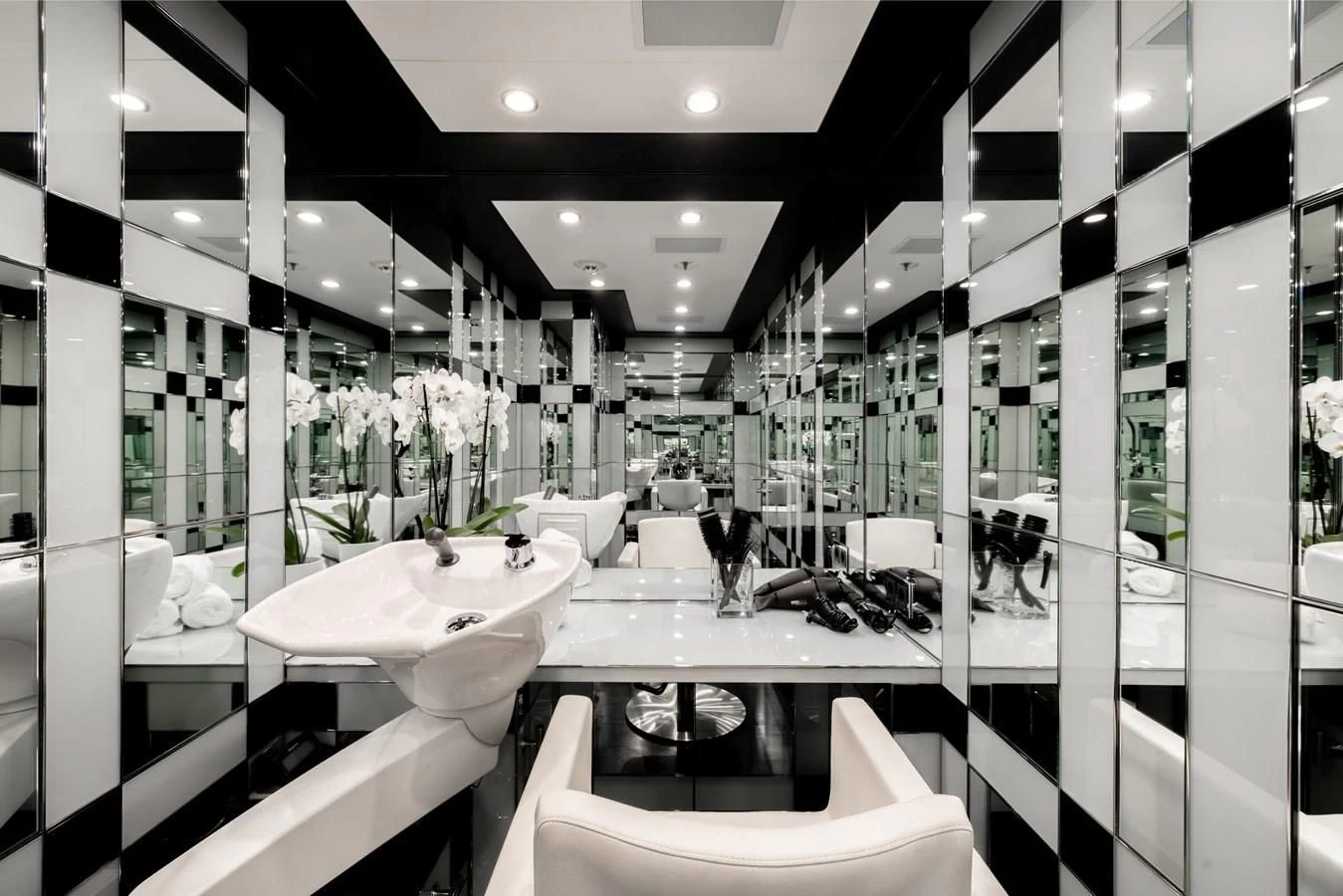 a bathroom with sinks and mirrors aboard BATELLO Yacht for Sale