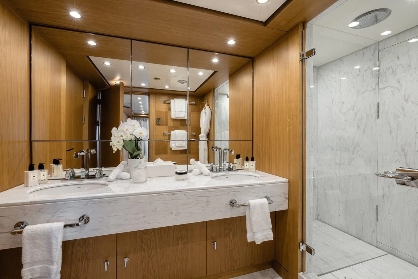 a bathroom with a large mirror aboard BATELLO Yacht for Sale