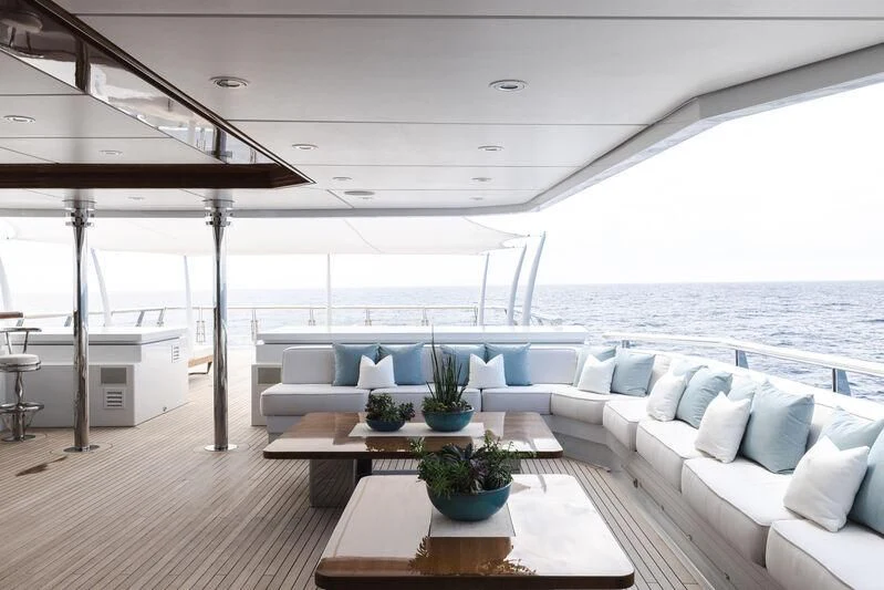 a large living room with a large body of water aboard BATELLO Yacht for Sale